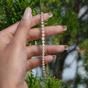 In hand view of moissanite tennis bracelet 