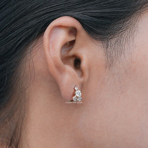 Colorless Round Cut Diamond Huggie Earrings 