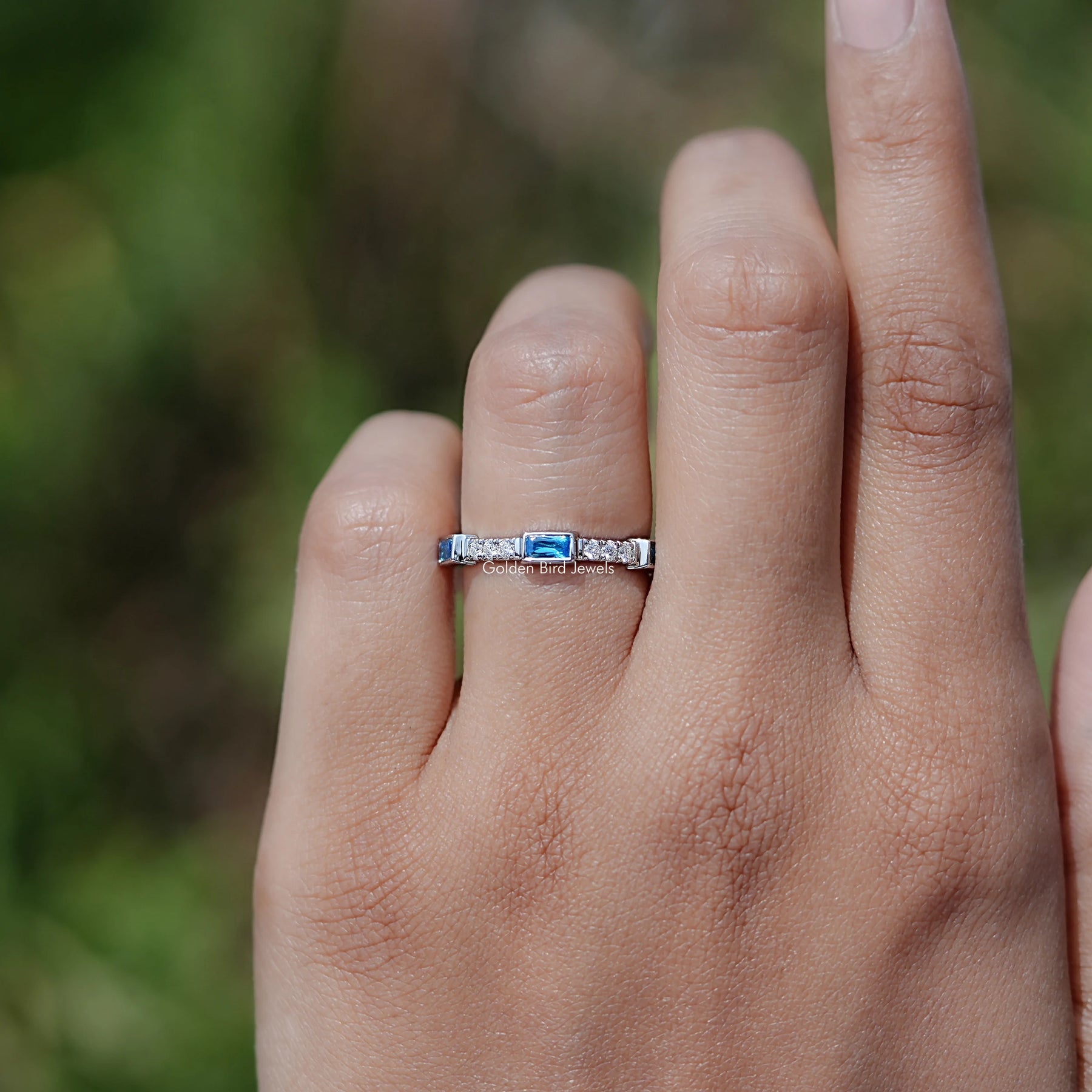 In Finger view of Baguette gemstone engagement ring 