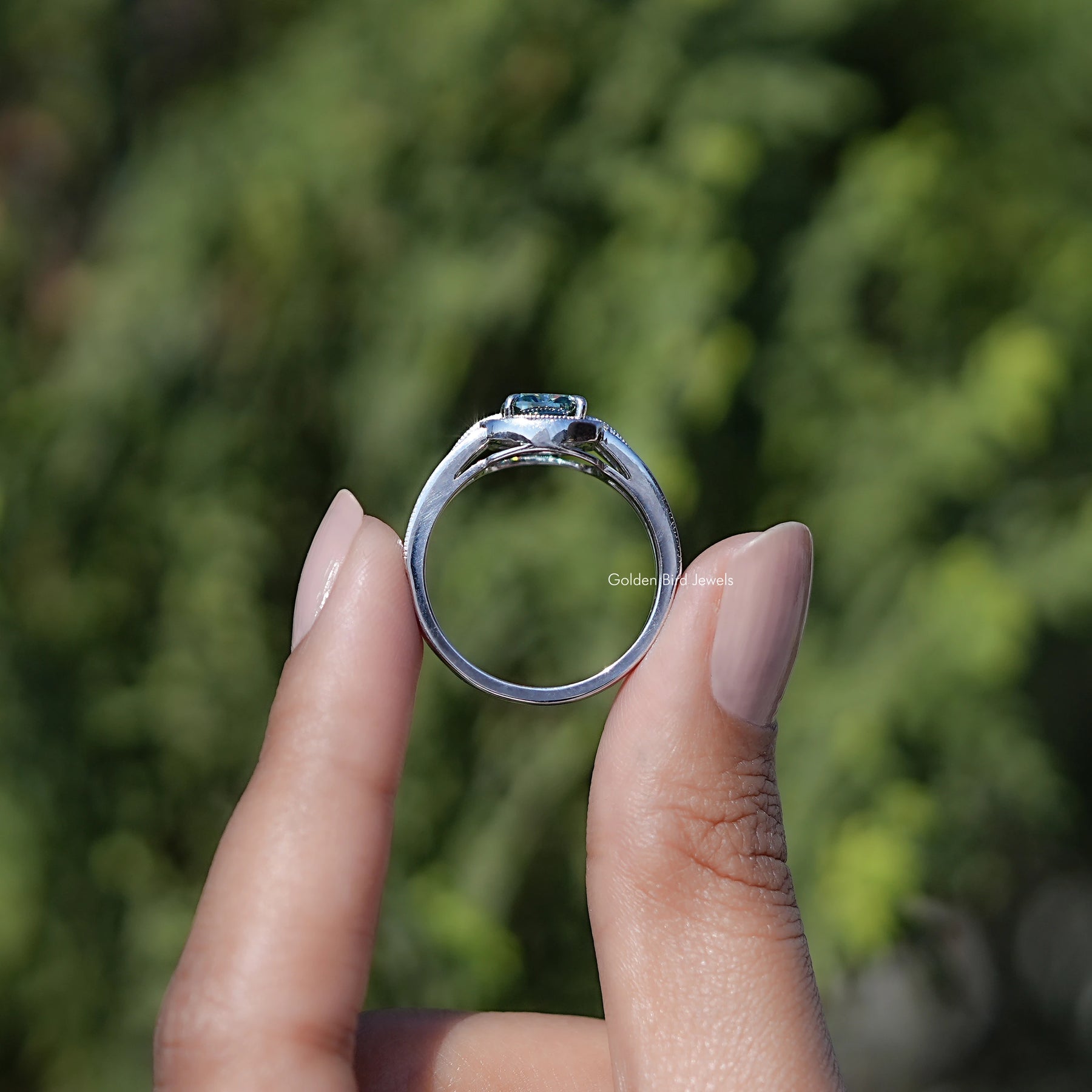Back view of Cushion Cut Moissanite ring in secure setting 