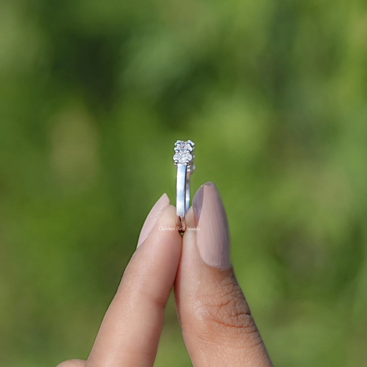 Side View of Oval Seven Stone Wedding Band

