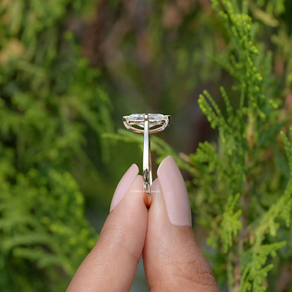 Side View Of Off White Marquise Moissanite Solitaire Ring  
