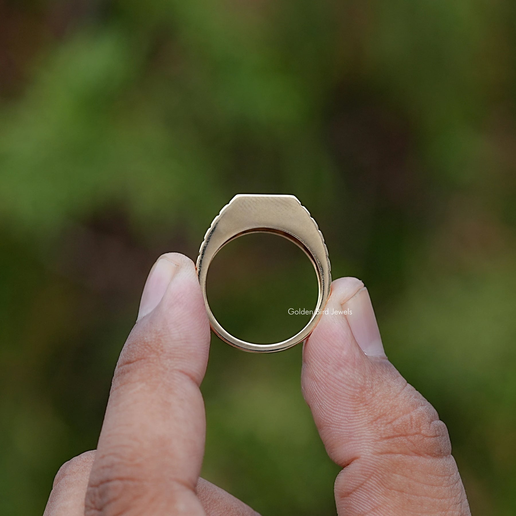 Back view of Princess Cut Black Gemstone ring in secure setting 