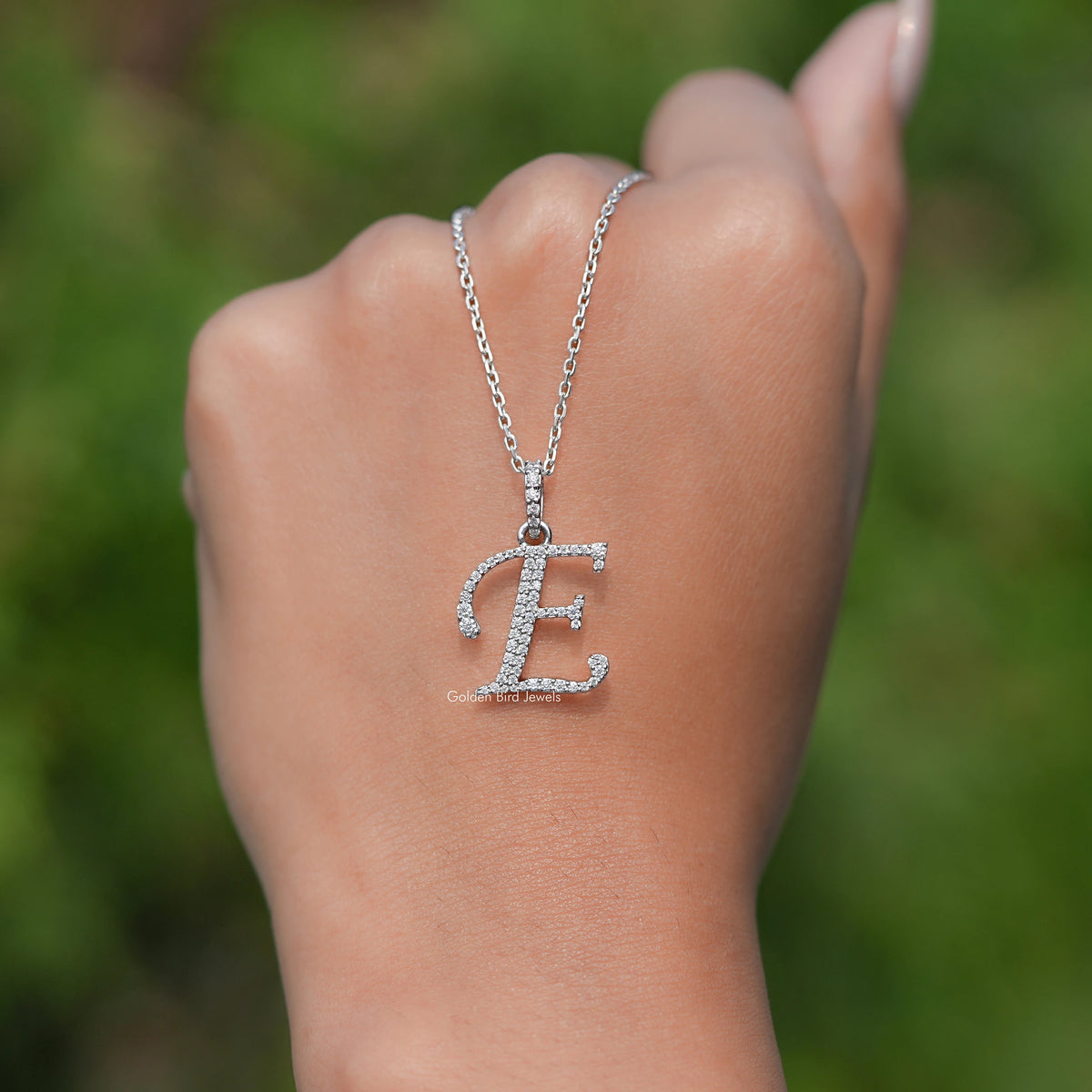 In hand Showing View Of Moissanite Solitaire pendant 