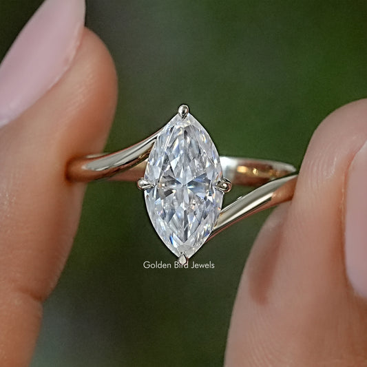 Marquise moissanite solitaire ring with prong-set pear-shaped center stone