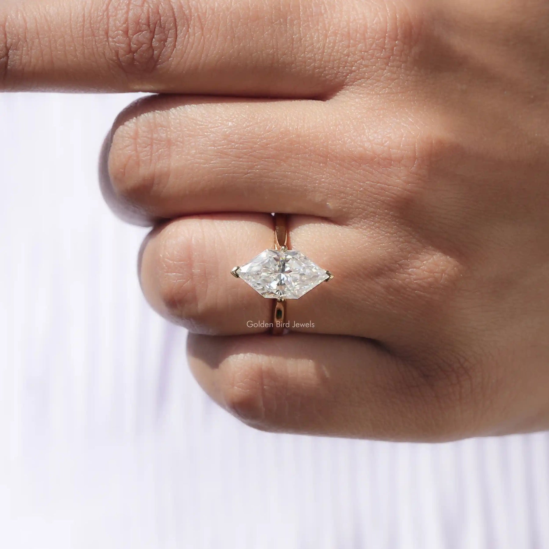Solitaire marquise cut moissanite ring with prong setting