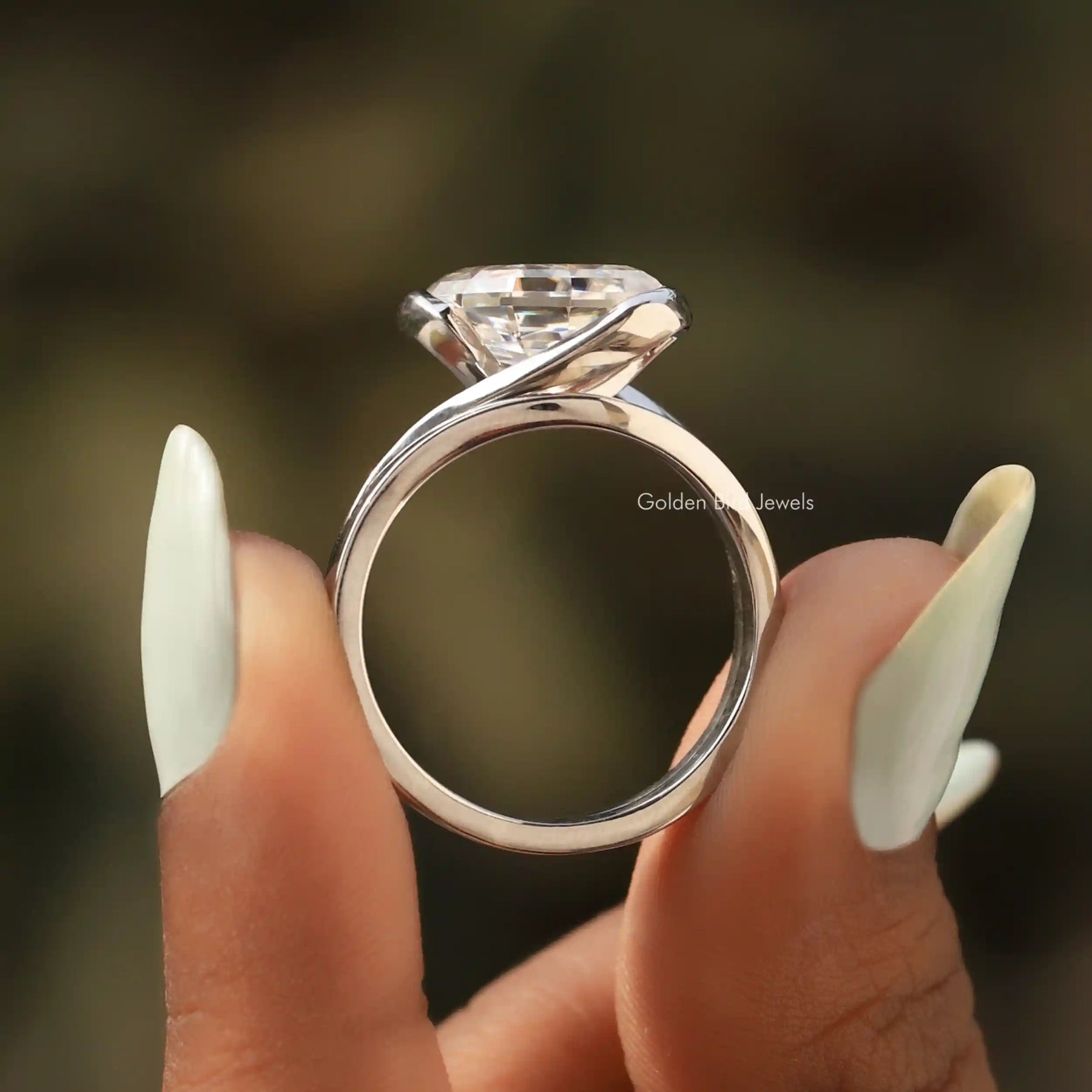 Back View of Oval Cut Moissanite Bypass Ring In two fingers
