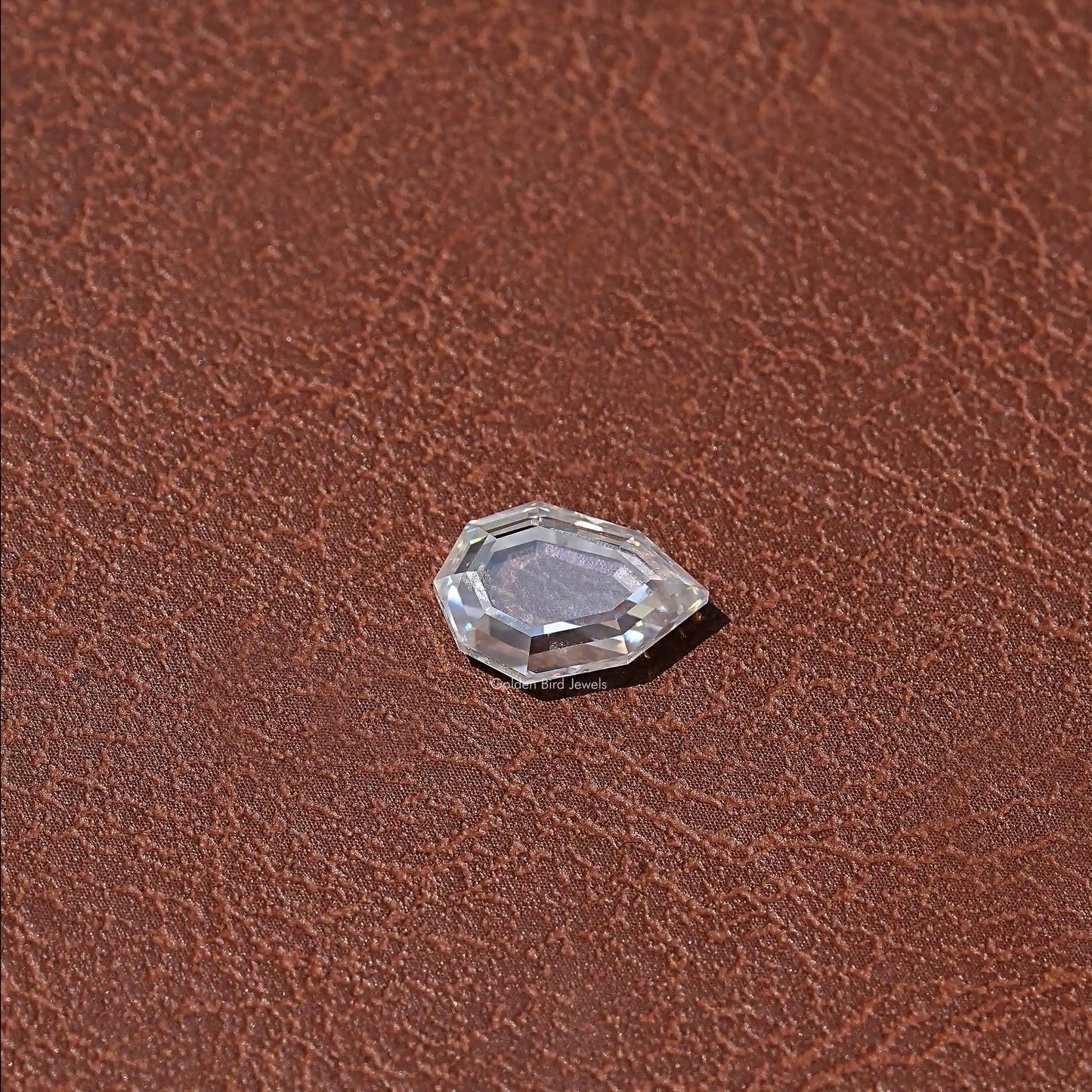Side VIew Of Colorless Step Cut Pear Loose Moissanite 
