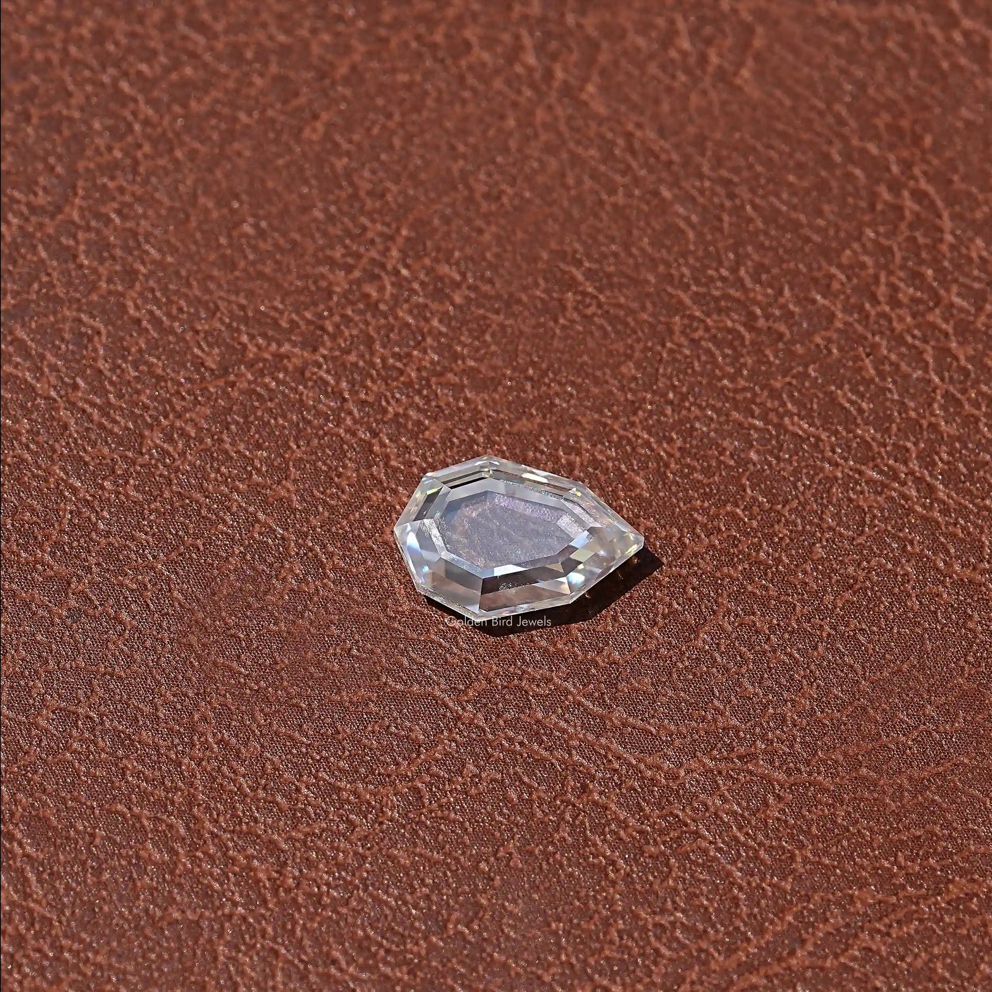 Side VIew Of Colorless Step Cut Pear Loose Moissanite 