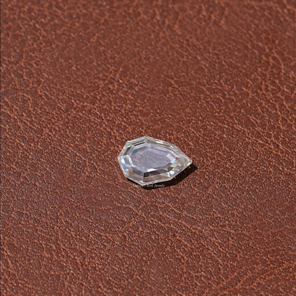Side VIew Of Colorless Step Cut Pear Loose Moissanite 