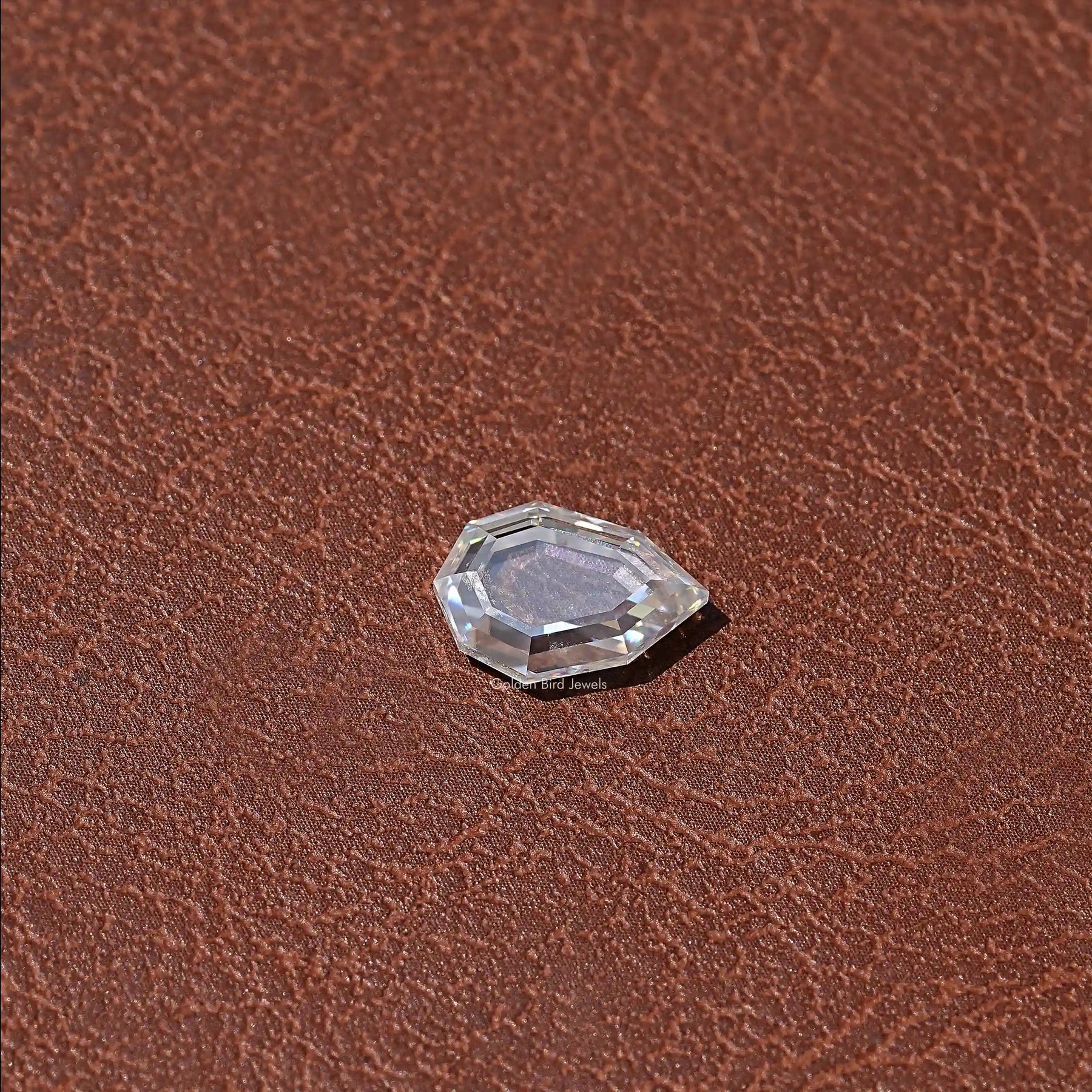 Side VIew Of Colorless Step Cut Pear Loose Moissanite 