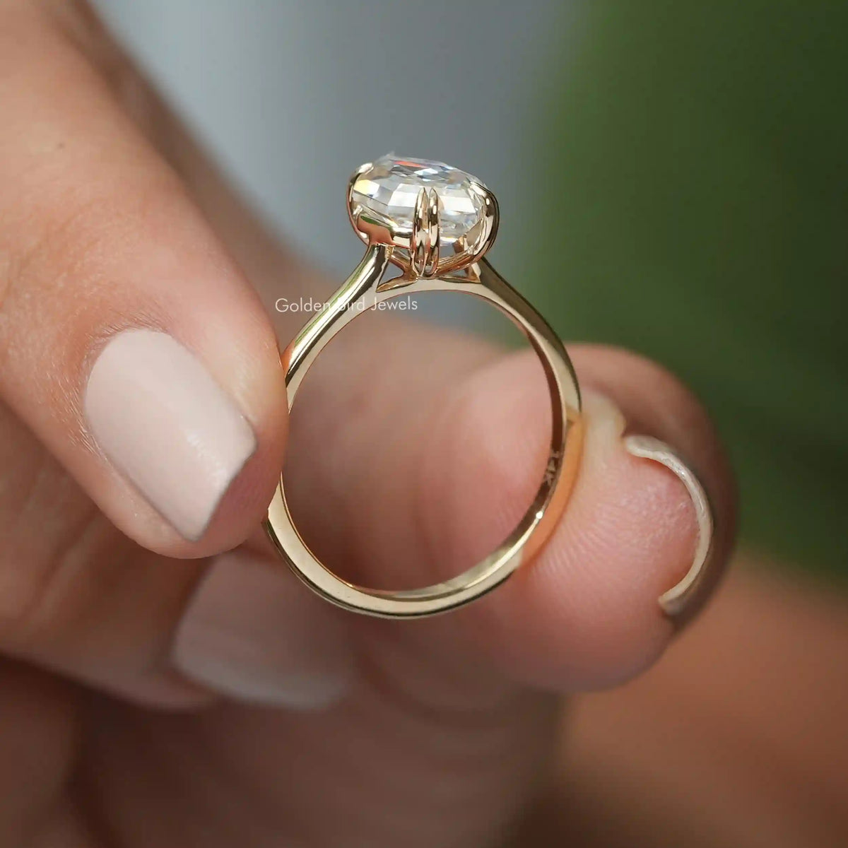 Back View of Cathedral Set Step Cut Dutch Marquise Cut Moissanite Ring In two fingers
