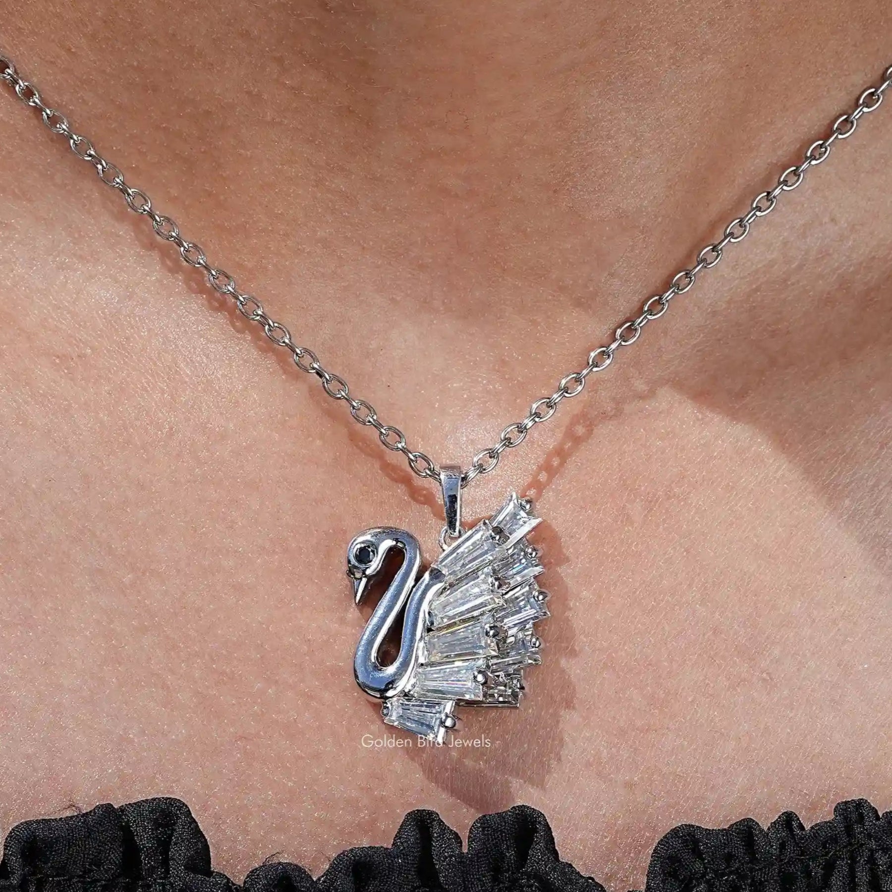 View of lab grown Moissanite Baguette cut swan pendant 