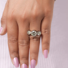 View of Bezel Set 3 Stone Moissanite Ring In White Gold