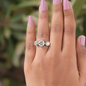 Detailed View Of Round Cut Moissanite 3 Stone Ring In Yellow Gold