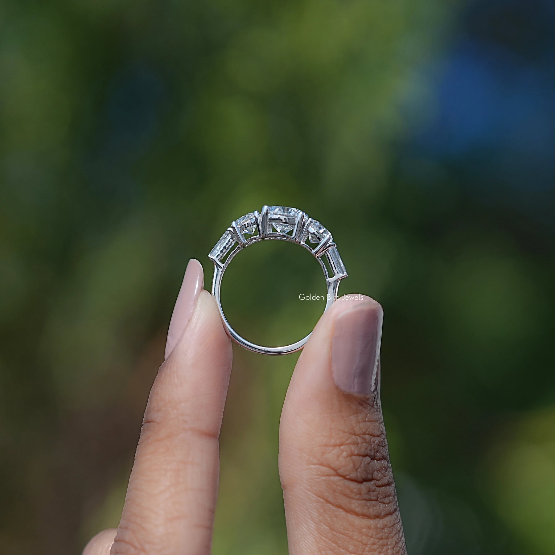 Round And Tapered Baguette Cut Five Stone Ring