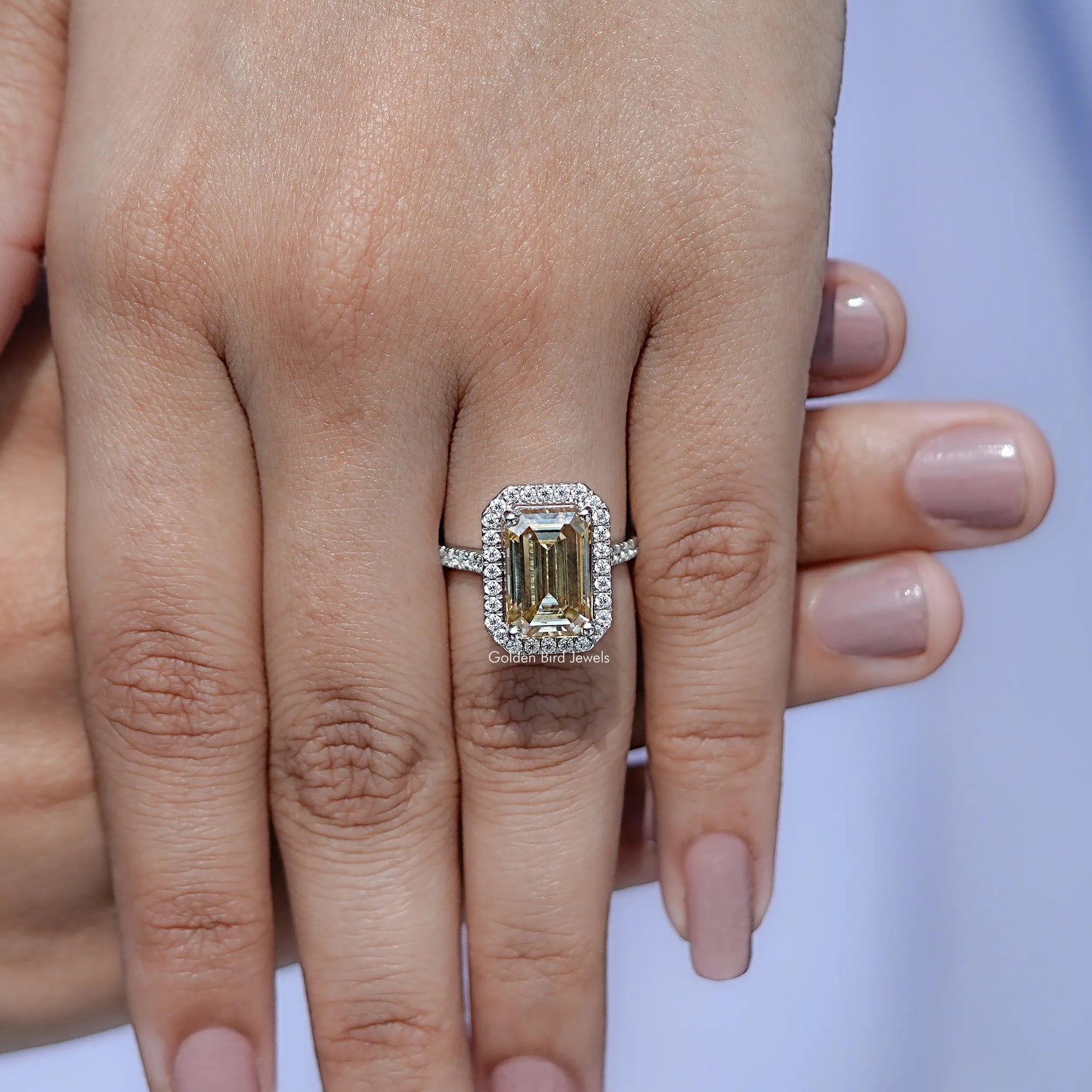 Top view of moissanite engagement ring in Emerald Cut for women 's wear