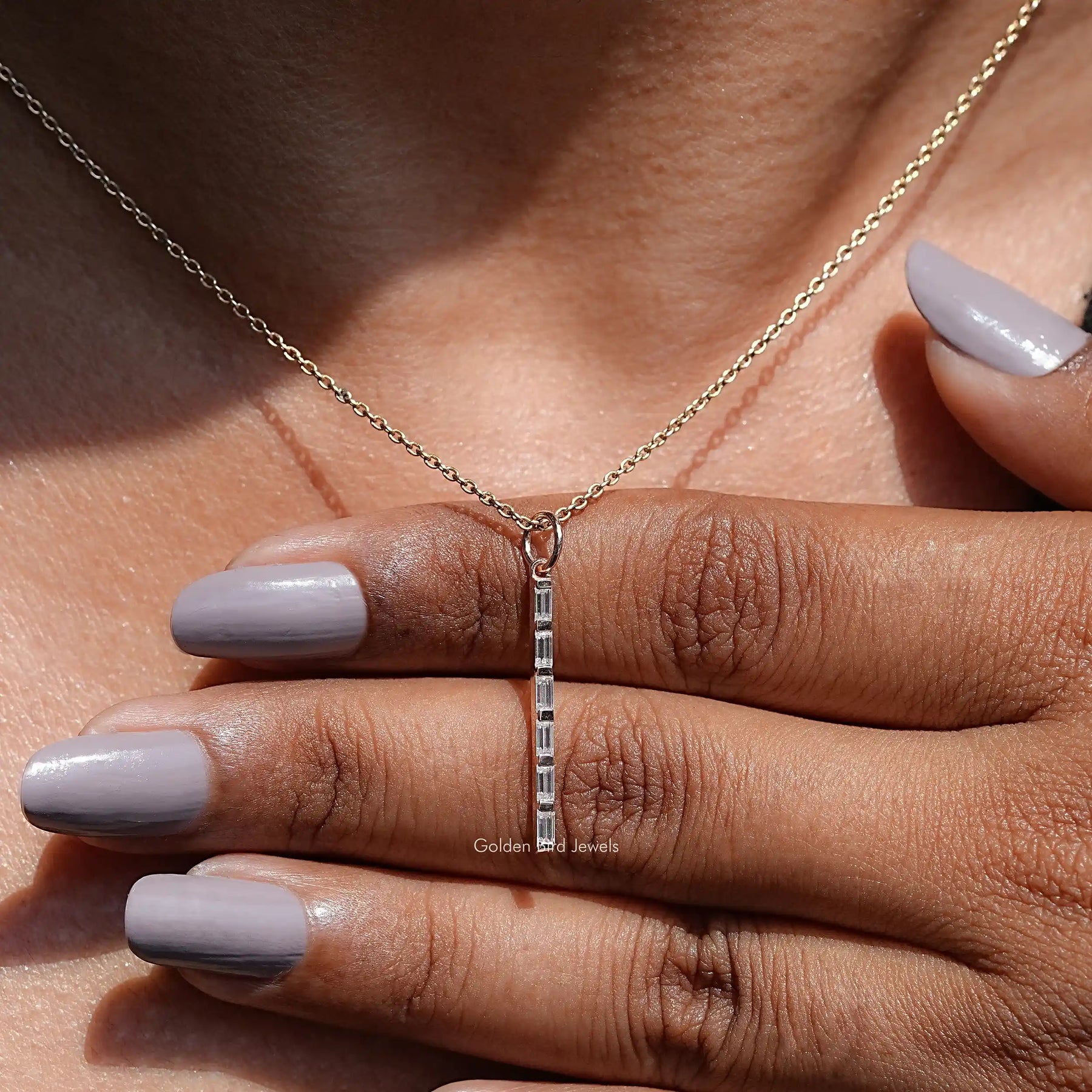 Full view of moissanite pendant in unique shape 