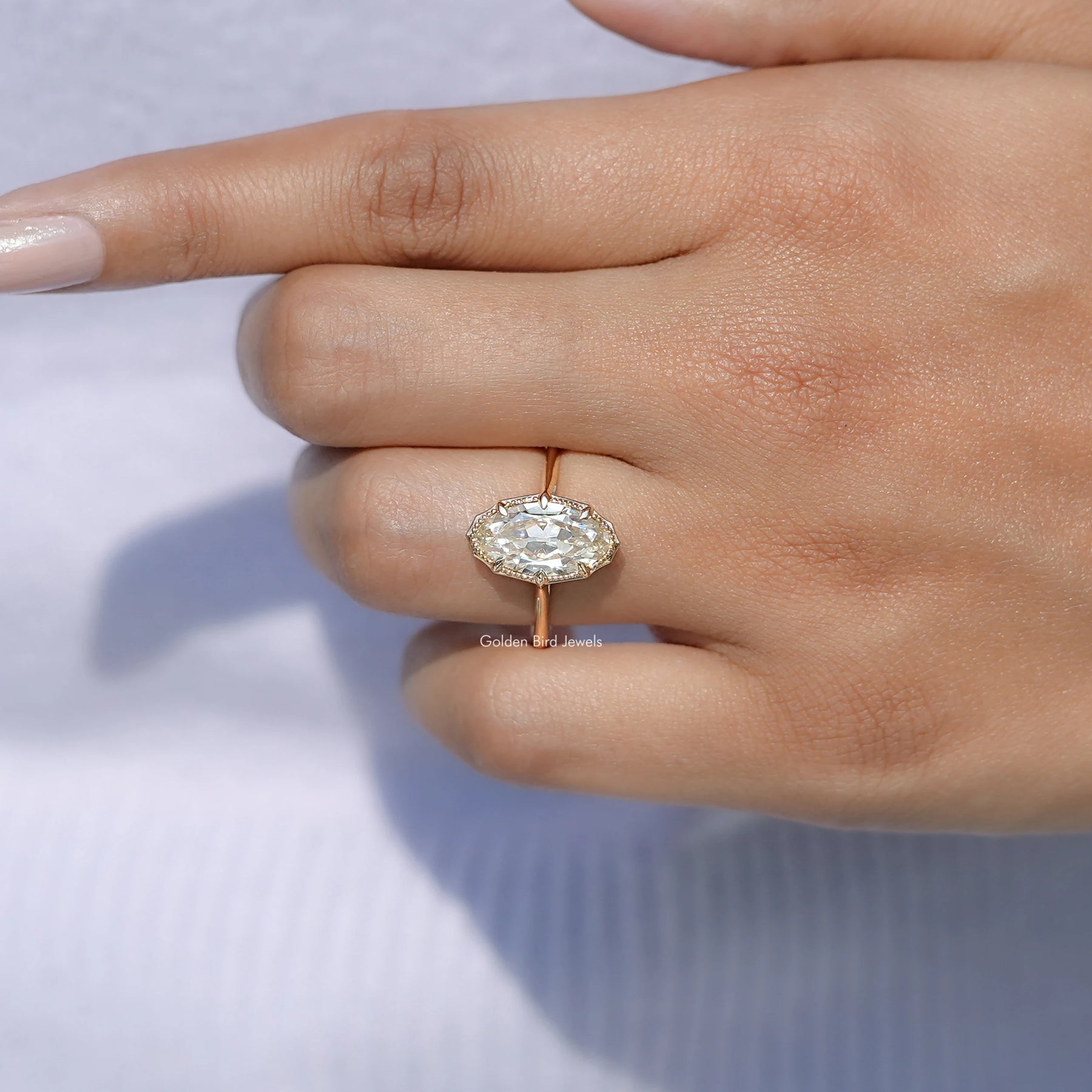 View of Moval Shape Moissanite Stone Ring in prongs setting 
