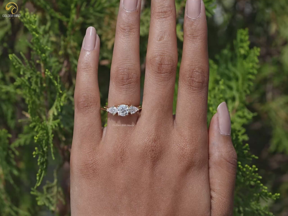 Youtube Video of Pear And Round Cut Lab Diamond Three Stone Ring