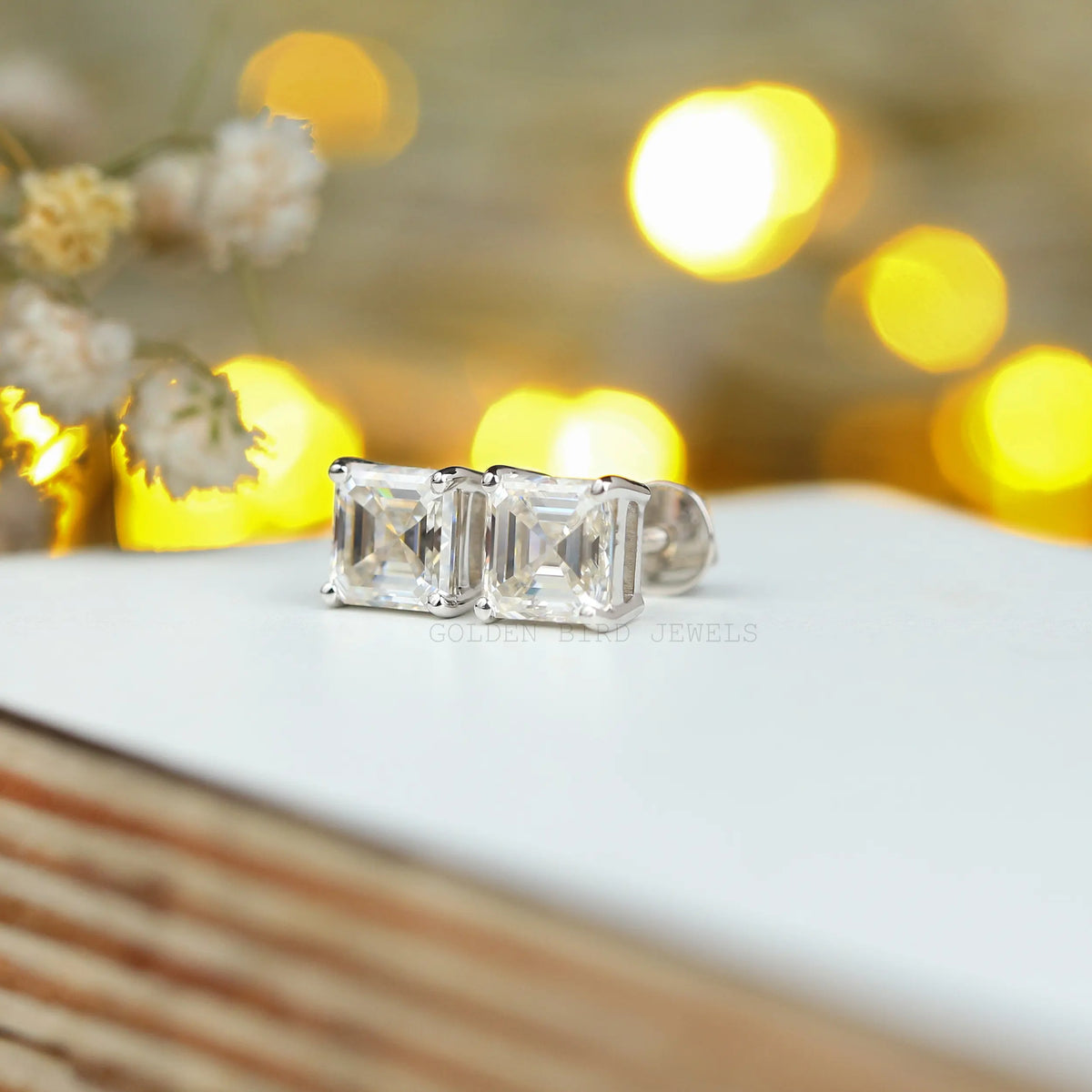 Side view of moissanite earings in white gold 