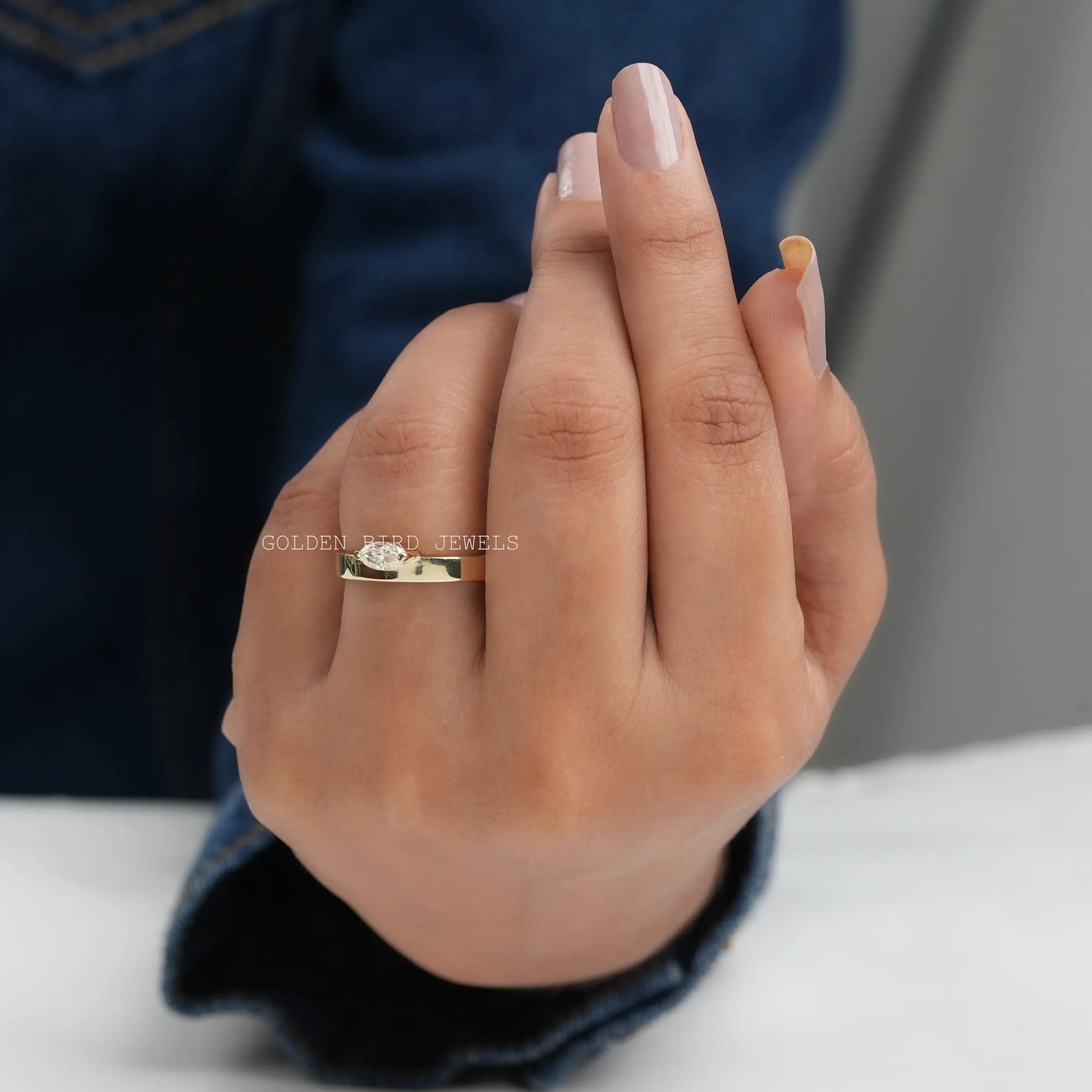 View of Moissanite Marquise Cut Solitaire Engagement Ring In Finger