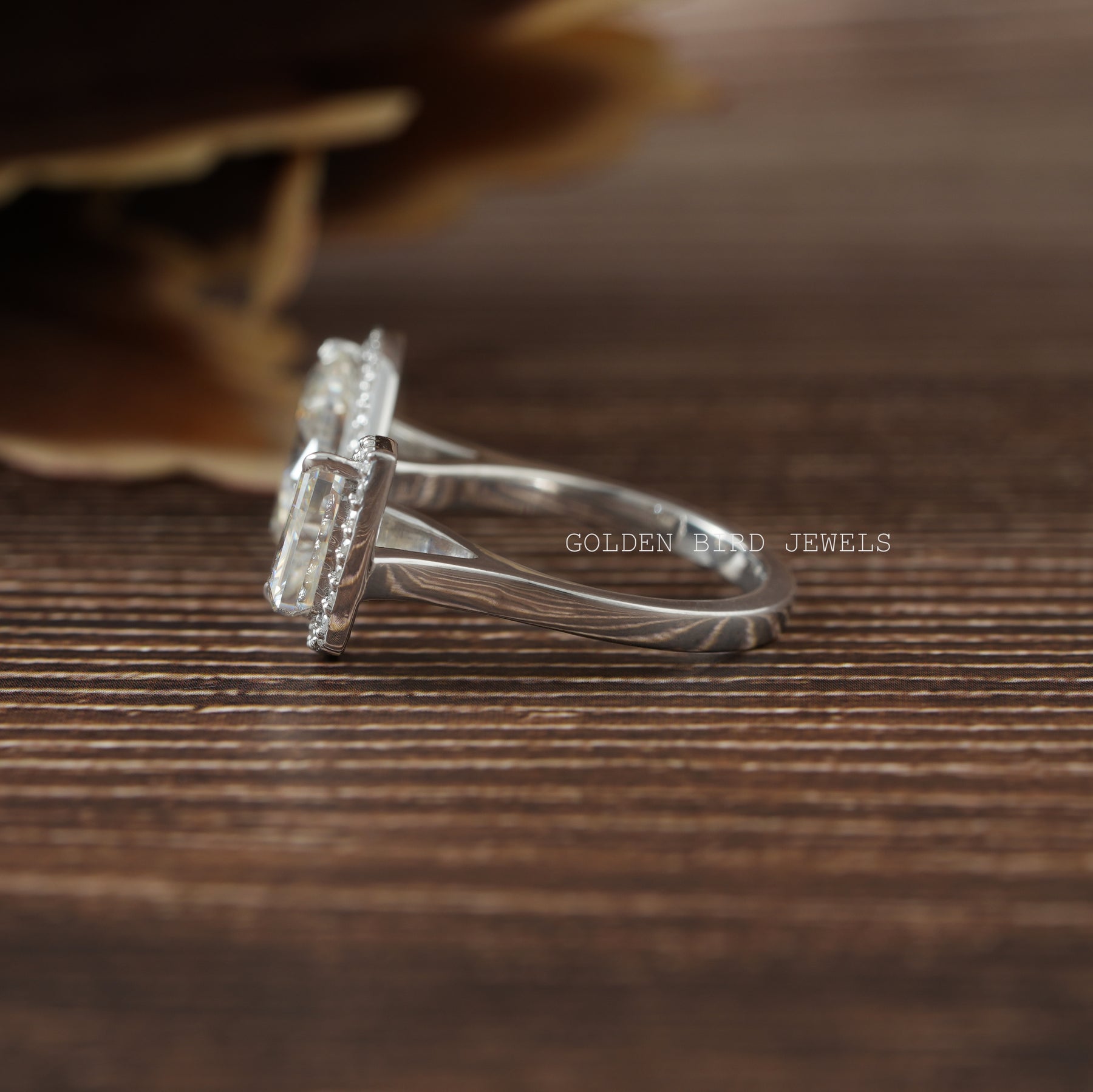 Marquies and pear cut moissanite  engagement ring in a secure setting 