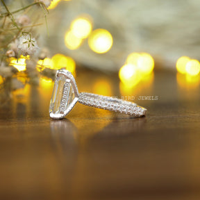 View of Emerald Cut Moissanite Hidden Halo Engagement Ring In White Gold