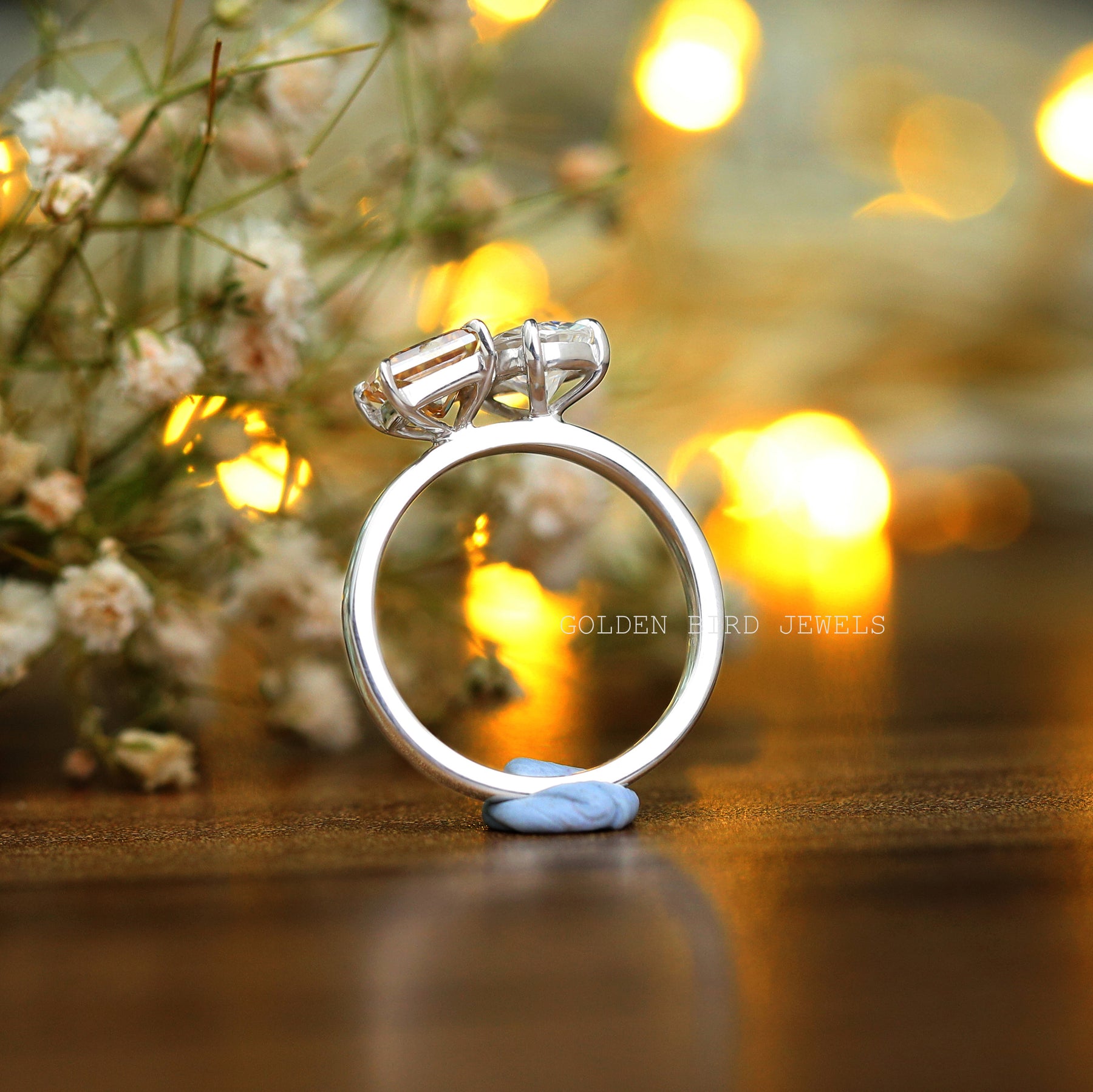 Back view of a pear-cut  ring in prongs setting 