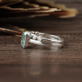 View of Blue Moissanite Bezel Set Ring In Finger